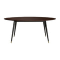 Eettafel met ovale houten blad en metalen poten